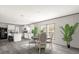 Modern kitchen with white cabinets and gray countertops at 1356 Cupid Ave, Christmas, FL 32709