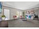 Spacious living room with ample natural light and comfortable seating at 1356 Cupid Ave, Christmas, FL 32709