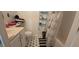 Small bathroom with a shower/tub combo, and white cabinetry at 13867 Sw 31St Ct, Ocala, FL 34473