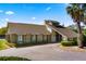 Community center featuring a unique architectural design, stone accents, and lush landscaping at 1417 Borg Ln, Winter Springs, FL 32708