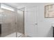 Clean bathroom with a walk-in shower and a single sink at 1977 Tohoqua Blvd, Kissimmee, FL 34744