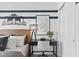 Bedroom with wood desk and gray bedding at 1977 Tohoqua Blvd, Kissimmee, FL 34744