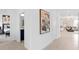 Bright hallway with view of bedroom and living room at 1977 Tohoqua Blvd, Kissimmee, FL 34744