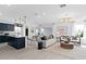 Open concept kitchen and living room with modern design at 1977 Tohoqua Blvd, Kissimmee, FL 34744