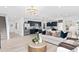 Bright living room with comfortable seating and open floor plan at 1977 Tohoqua Blvd, Kissimmee, FL 34744