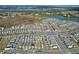 A Primary-planned community with homes, green spaces, ponds, and easy access to amenities and roadways at 2429 Volunteer Ave, Kissimmee, FL 34744
