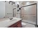 Elegant bathroom with a vanity, large mirror, and a shower with sliding glass doors at 2438 River Rise Ct, Orlando, FL 32828