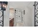 Hallway with tiled floor and decorative iron gate at 2438 River Rise Ct, Orlando, FL 32828