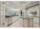 Bright kitchen with granite countertops, stainless steel appliances, and a center island at 2438 River Rise Ct, Orlando, FL 32828