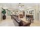 Open-concept living area with seamless transition to the kitchen and dining space at 2438 River Rise Ct, Orlando, FL 32828