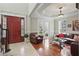 Inviting living room featuring tile and hardwood floors with an elegant seating area at 2438 River Rise Ct, Orlando, FL 32828
