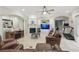 Spacious living room featuring a fireplace, media center, and comfortable seating at 2438 River Rise Ct, Orlando, FL 32828