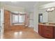 Luxurious main bathroom with a soaking tub, tiled shower, and custom vanity at 2438 River Rise Ct, Orlando, FL 32828