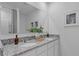 Bathroom boasts a double vanity with granite countertops at 3516 Fort Mellon Ln, Sanford, FL 32773