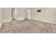 View of the carpeted bedroom with an open doorway and TV hookups on the wall at 3773 Moon Dancer Pl, St Cloud, FL 34772