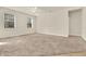 Large bedroom with carpet flooring, neutral walls, ceiling fan and natural lighting at 3773 Moon Dancer Pl, St Cloud, FL 34772