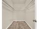 Walk-in closet with carpet flooring and metal shelving at 3773 Moon Dancer Pl, St Cloud, FL 34772