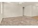 Bright living room featuring carpet flooring, neutral walls and overhead lighting at 3773 Moon Dancer Pl, St Cloud, FL 34772