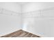 Walk-in closet offers wire shelving and wood-look floors at 42 Fisher Way Trak, Ocklawaha, FL 32179