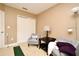 Bedroom with two chairs and a putting green at 4401 Messina Dr, Lake Mary, FL 32746