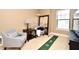Bedroom with seating area and indoor putting green at 4401 Messina Dr, Lake Mary, FL 32746