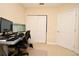 Home office featuring a standing desk and dual monitors at 4401 Messina Dr, Lake Mary, FL 32746