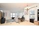 Spacious living room with large windows and neutral colored furniture at 4401 Messina Dr, Lake Mary, FL 32746