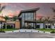 Elegant community center entrance at sunset at 5702 Gingham Dr, Kissimmee, FL 34758