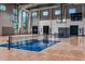 Indoor court with basketball hoops and tennis net at 5702 Gingham Dr, Kissimmee, FL 34758