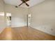 Large bedroom with laminate wood flooring and access to bathroom at 6432 Delta Leah Dr, Orlando, FL 32818