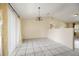 Dining room with tile floors, chandelier, and sliding doors at 6432 Delta Leah Dr, Orlando, FL 32818