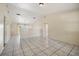 Living room with tile floors and access to other rooms at 6432 Delta Leah Dr, Orlando, FL 32818