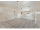 Spacious living room with tile floors and neutral walls at 6432 Delta Leah Dr, Orlando, FL 32818
