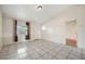 Bright living room featuring tile floors and a window with curtains at 6432 Delta Leah Dr, Orlando, FL 32818