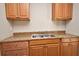 Kitchen sink with wood cabinets, drawers and countertops at 878 Rockhill St, Deltona, FL 32725