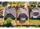 Aerial view showing the home's layout within its lot, along with a screened-in pool and surrounding landscaping at 402 Turnstone Way, Orlando, FL 32828