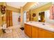 Bright bathroom with double sinks and shower at 402 Turnstone Way, Orlando, FL 32828
