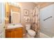 Cozy bathroom with vanity, toilet, and tub-shower combo at 402 Turnstone Way, Orlando, FL 32828