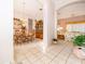 Inviting foyer with tile flooring, leading to the formal dining and living spaces with natural light at 402 Turnstone Way, Orlando, FL 32828