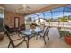 Screened patio with comfortable seating and outdoor dining area at 402 Turnstone Way, Orlando, FL 32828
