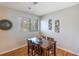 Cozy dining area with wood table and hardwood floors at 1000 Winderley Pl # 122, Maitland, FL 32751