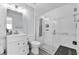 Modern bathroom with a glass-enclosed shower and white vanity at 104 Sunny Oak Trl, Kissimmee, FL 34746