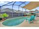 Inviting kidney-shaped swimming pool with a tranquil atmosphere at 104 Sunny Oak Trl, Kissimmee, FL 34746