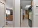 View into kitchen from hallway, refrigerator visible at 10897 Sw 80Th Ct, Ocala, FL 34481