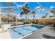 Screened pool with view of lake and backyard at 11753 Fan Tail Ln, Orlando, FL 32827