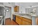 Kitchen area with stainless steel appliances and breakfast bar at 13003 Plantation Park Cir # 1319, Orlando, FL 32821