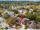 An aerial view showcases the property's location within a desirable neighborhood and wooded surroundings at 13713 Meadowpark Ave, Orlando, FL 32826