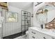 Stylish bathroom featuring subway tile walls, a modern vanity, and a glass-enclosed shower for a spa-like experience at 1412 Nebraska St, Orlando, FL 32803