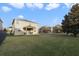 Large backyard with grassy area and home view at 14502 Bahama Swallow Blvd, Winter Garden, FL 34787