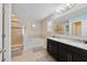 Elegant bathroom with double vanity and soaking tub at 14502 Bahama Swallow Blvd, Winter Garden, FL 34787